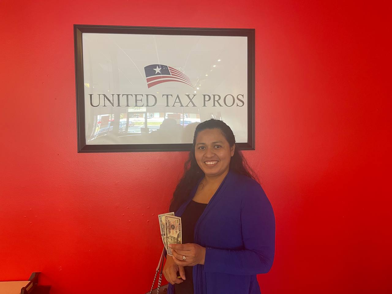 Real client receiving $150 referral reward cash