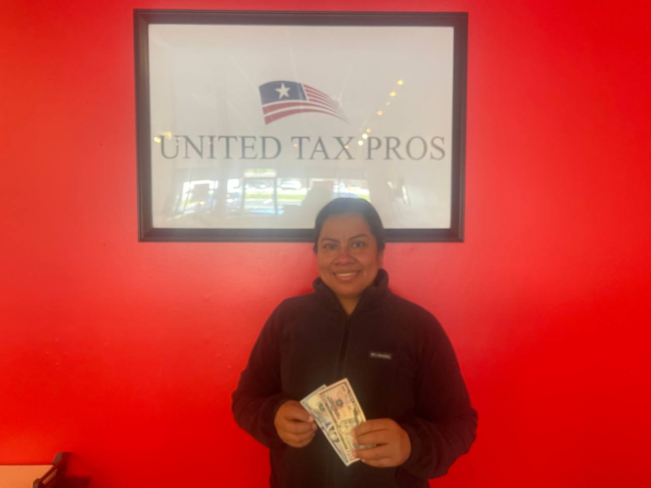 Real client receiving $150 referral reward cash